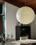 The Akari Boru - Lucy’s Lamps is a minimalist paper lantern pendant lamp inspired by traditional Japanese design. This aesthetic lamp adds a warm, soft glow to any room, perfect for living rooms, bedrooms, or reading spaces. Combining modern designer lighting with vintage charm, The Akari Boru creates a cozy, timeless ambiance ideal for both modern and retro interiors.
