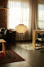 The Akari Moon Jar - Lucy’s Lamps is a modern paper lantern floor lamp with a soft glow, perfect as a minimalist lamp or aesthetic lamp. Functions as a light therapy lamp, LED floor lamp, tripod floor lamp, or bedside lamp for modern lamp for bedroom or floor lamps for living room.