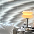 The Capella - Lucy’s Lamps retro stained glass lamp serves as a modern table lamp for bedroom or living room. This small desk lamp is perfect as a bedside table lamp, side table lamp, light therapy lamp, and aesthetic lamp for minimalist spaces. Explore Lucys Lamps for more home lighting ideas.