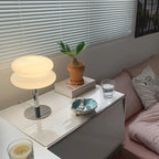 The Capella - Lucy’s Lamps retro stained glass lamp serves as a modern table lamp for bedroom or living room. This small desk lamp is perfect as a bedside table lamp, side table lamp, light therapy lamp, and aesthetic lamp for minimalist spaces. Explore Lucys Lamps for more home lighting ideas.