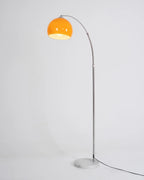 The Cosimo - Lucy’s Lamps is a retro stained glass orange floor lamp designed as a modern arc floor lamp. This aesthetic lamp works as a minimalist arc lamp, LED floor lamp, tripod floor lamp, or corner floor lamp. Ideal for modern lamp for bedroom or floor lamps for living room setups.