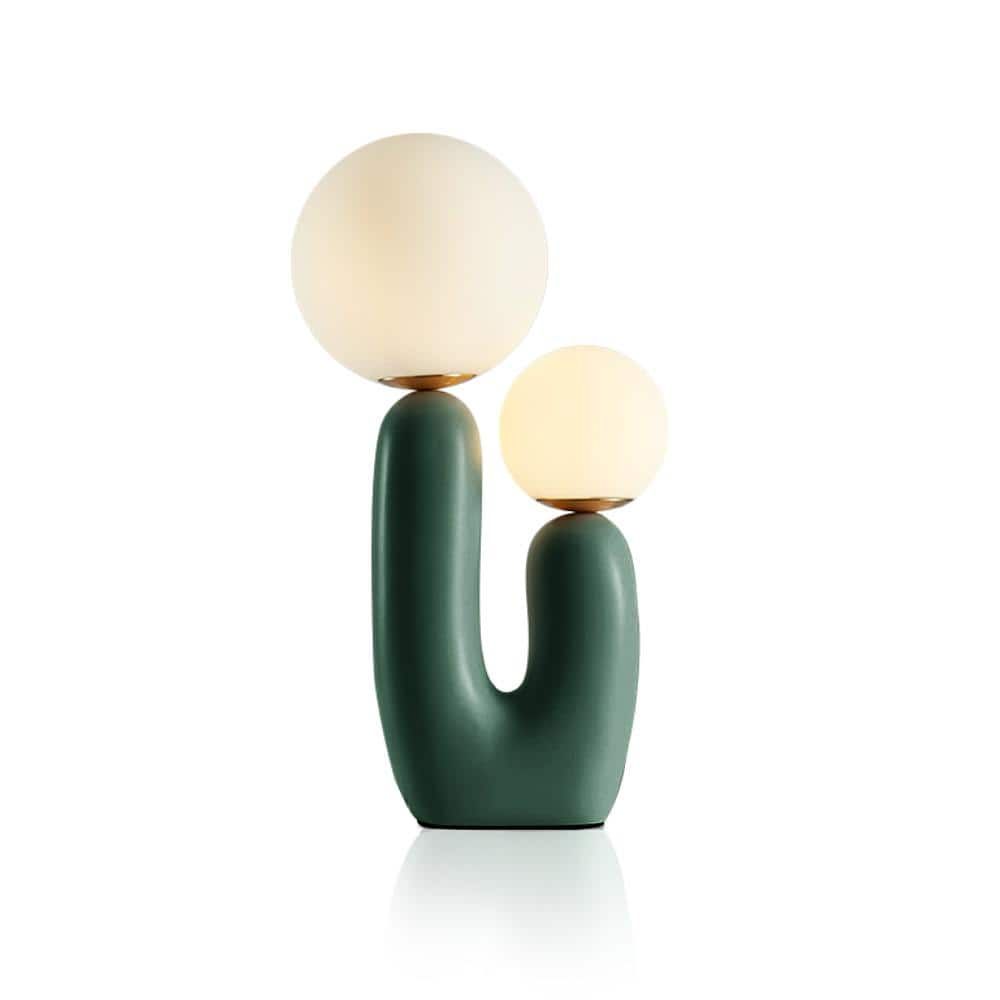The Ophelia - Lucy’s Lamps is a modern table lamp with a sculptural cactus-inspired base and twin frosted glass globes. This aesthetic lamp serves as a minimalist bedside lamp, desk lamp, or side table lamp for living rooms and bedrooms. Combining retro charm and modern designer lighting, The Ophelia adds warmth, elegance, and vintage sophistication to any home décor.