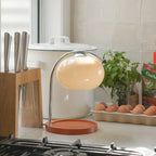 The Solange - Lucy’s Lamps is a modern table lamp with candle warmer lamp functionality. Aesthetic retro stained glass lamp ideal as a bedside table lamp, small desk lamp, or minimalist side table lamp. Perfect for bedroom table lamps or modern lamp for living room styling. Explore Lucys Lamps for more home lighting ideas.